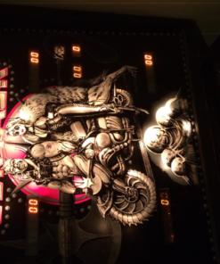 Close-up of the Centaur Pinball Machine playfield, showcasing detailed artwork